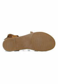 Brune ruskindsandaler med en flad, struktureret gummisole. Har åbent tådesign og justerbar spænde-strop. Minimalistisk stil og neutral farve.