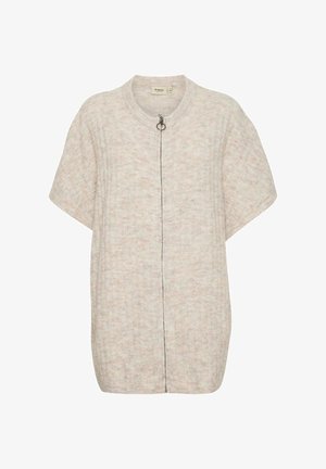 Cardigan color beige chiaro con maniche corte, tessuto a coste, zip frontale e spacchi laterali. Cuciture scure a contrasto lungo la zip.