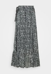 Jupe maxi fluide avec un motif abstrait noir et blanc, ourlet à volants superposés et fermeture à nouer sur le côté, fabriquée en tissu léger.