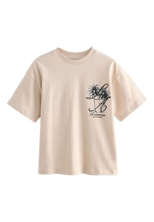 Beige T-shirt med korte ærmer med sort palmegrafik og stiliserede bogstaver på venstre brystområde.