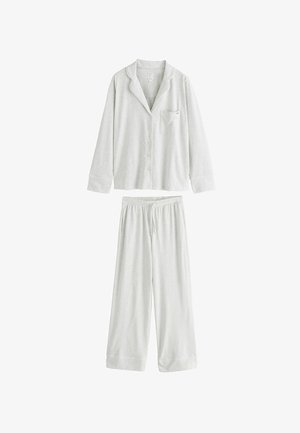 Helles graues Langarm-Hemd mit Kragen und Brusttasche, kombiniert mit passenden weit geschnittenen Hose mit elastischem Bund und Kordelzug.