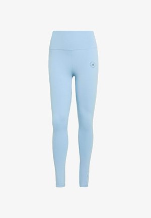 Leggings de sport taille haute bleu clair avec un petit logo circulaire sur la partie supérieure de la cuisse gauche, sur fond blanc.