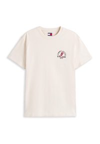 Cream cotton t-shirt, short sleeves, crew neck. Features a circular logo with "TOMMY JEANS" and "NEW YORK CITY" in dark red and black.