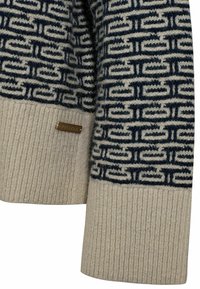 Pulover bej cu un model geometral bleumarin, având o textură ribbed și o mică etichetă metalică atașată la bază.