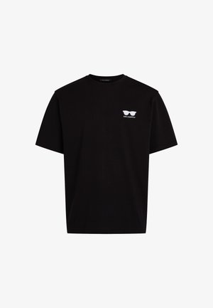 Czarny bawełniany t-shirt z krótkimi rękawami, z białą grafiką okularów przeciwsłonecznych oraz napisem "KARL LAGERFELD" na lewej piersi.