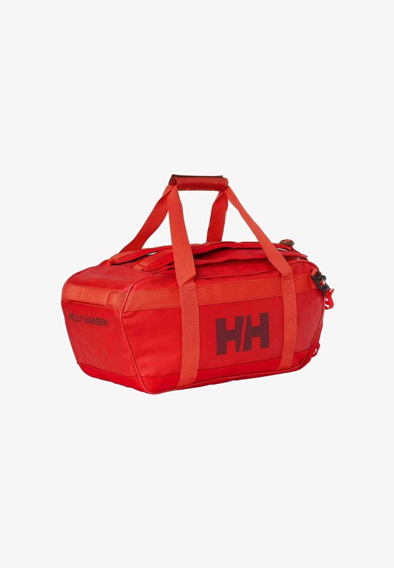 Bolsa de viaje roja Helly Hansen con logo negro de HH, doble asa para llevar y bolsillo lateral con cremallera sobre fondo blanco.