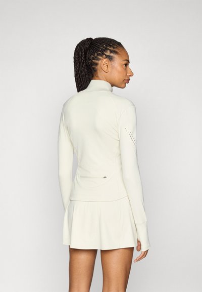 adidas by Stella McCartney Jakna za treniranje - almond milk