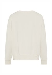 Cremefarvet sweatshirt med rund halsudskæring, dropped skul seams og ribbede manchetter og kant. Blødt stof med en glat tekstur.