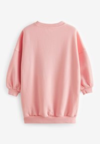 Růžová oversized mikina s dlouhými, nafouknutými rukávy. Vyrobená z měkké tkaniny, má žebrovaný výstřih a lem pro zvýšení textury.