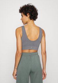Yogasearcher HADU SEAMLESS BRA - Sutiã desportivo de suporte ligeiro - lavastone