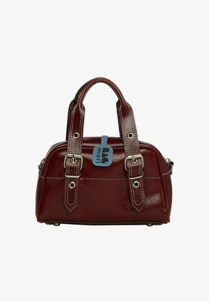 Small dark red leather handbag with two sturdy handles, silver buckles, white stitching, and a blue tag labeled "BAG mori."