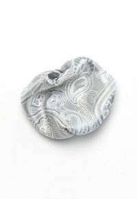 Silver fabric scrunchie with paisley pattern, smooth texture, and gathered design. Compact shape suitable for securing hair.