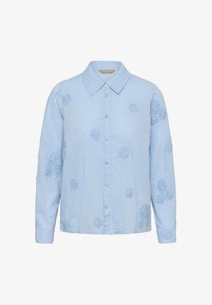 Svetlomodra srajca s gumbi in dolgimi rokavi, okrašena z vezenimi cvetličnimi vzorci ter klasičnim ovratnikom. Mehka bombažna tkanina, sproščen kroj.