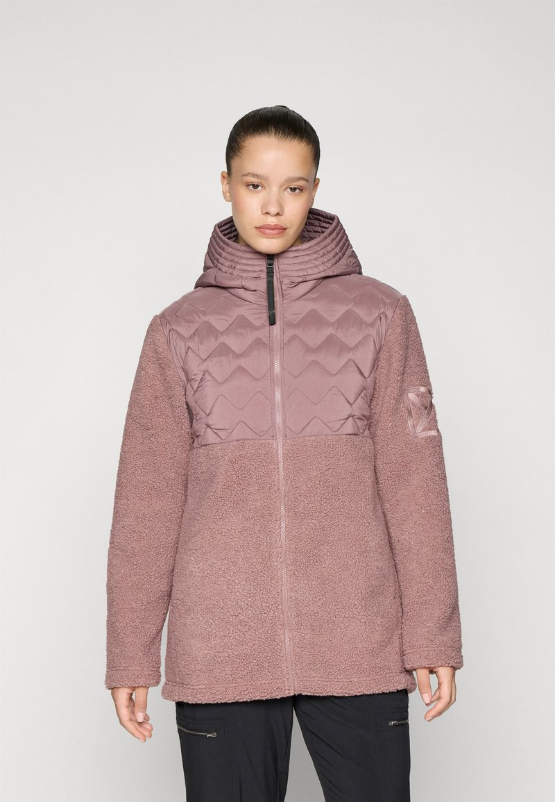 Padded hooded jacket in soft mauve fleece, featuring a quilted body, zipper front, and textured sleeves. Accented with a logo on the arm.