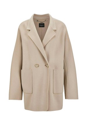 Beige Doppelreiher-Blazer mit zwei Fronttaschen, Reverskragen und einer glatten Stoffstruktur. Die Knöpfe haben einen dezenten Glanz.