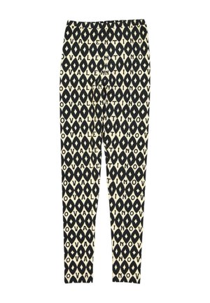 Leggings con formas de diamante negras repetidas y la palabra Valentino impresa sobre fondo crema.