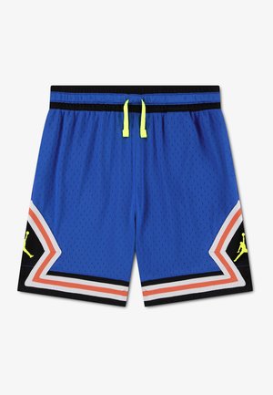 Pantalones cortos de baloncesto azules con ribete en zigzag negro, blanco y naranja, cordón amarillo neón y paneles negros con logos Jumpman en amarillo neón.