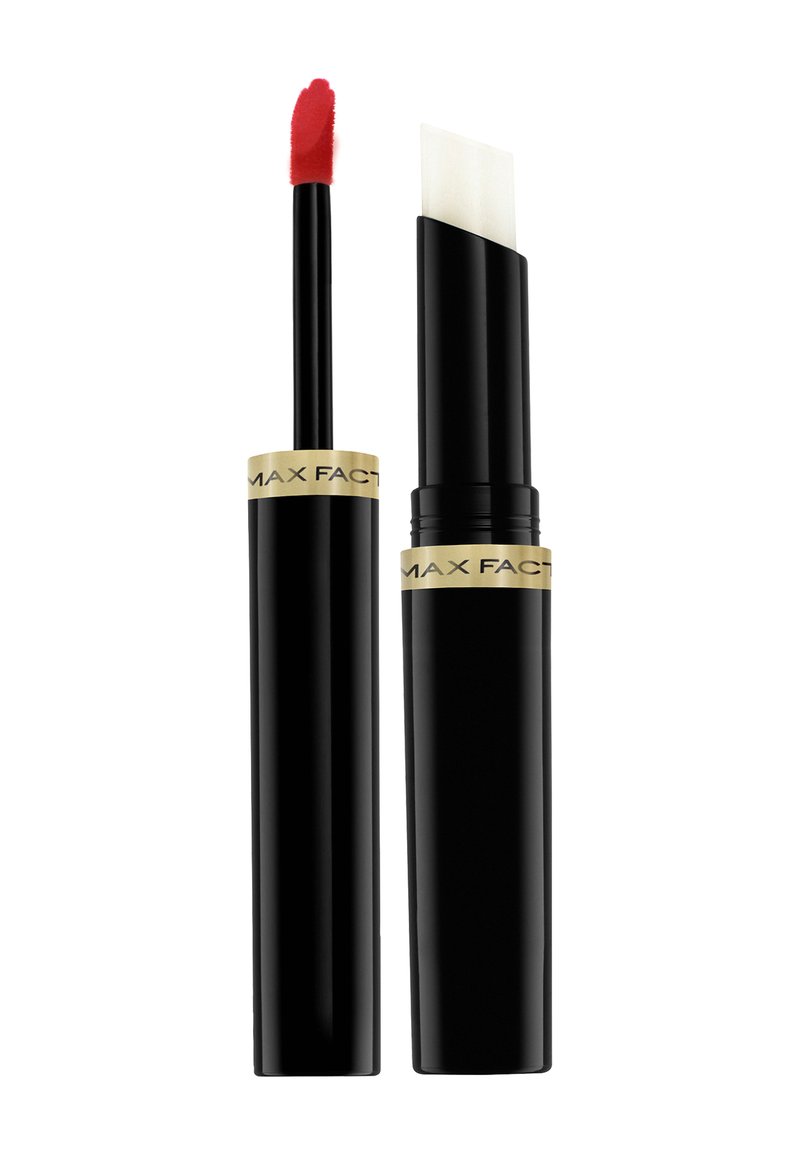Lipstick tube with a black matte finish and gold accents. Includes a red applicator wand and a slanted, white lip product.