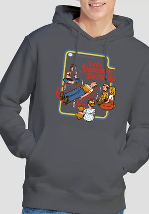 Children sitting around a boy lying inside a red pentagram, with "Let's Summon Demons" text above them on a gray hoodie.