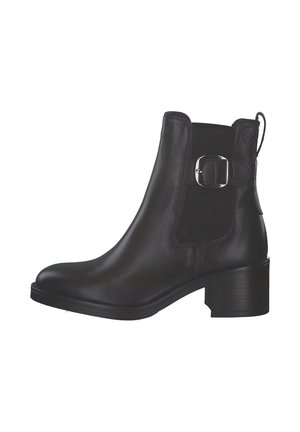 Stivaletto in pelle nera con un pannello elastico laterale, punta tonda e un dettagli in metallo argentato sul lato esterno. Design con tacco a blocco.