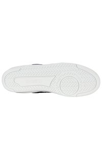 White rubber sole with textured tread pattern, featuring K-Swiss branding. The design is flat and slightly curved at the edges.