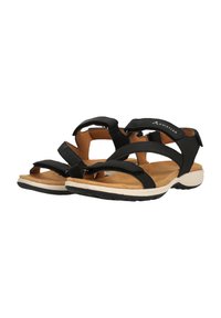 Sorte sandaler med justerbare stropper, blød beige fodseng, gummisål og diskret brandingdetalje på stropperne.