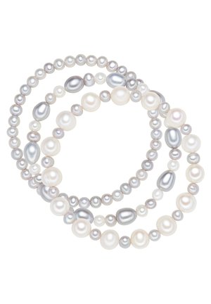 Three strands of pearls in various sizes. Colors include white, off-white, and shades of silver. Round and oval shapes are featured.