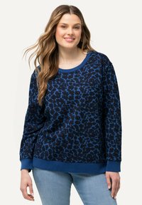 Niebieska bluza z wzorem pantery, z długimi rękawami, okrągłym dekoltem i ściągaczami. Wykonana z miękkiego materiału, o luźnym kroju, z jednolitą niebieską taśmą w pasie.