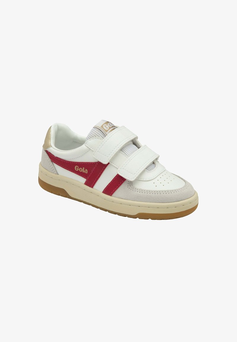 Sneaker bianco con accenti rossi e beige, dotato di linguetta in rete, fasce in velcro, punta in suede e suola in gomma testurizzata. Logo del marchio visibile.