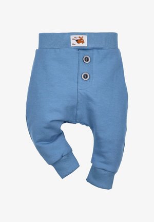 Pantalons pour bébé bleu clair en coton doux. Dotés d'une taille et de poignets côtelés, de deux boutons sur le devant et d'une étiquette sur le thème des chiens.