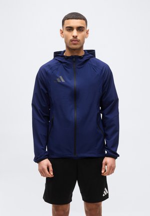 TIRO TRAVEL  - Tuulejope - team navy blue 2/black