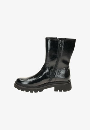 Black ankle boots with a glossy patent finish, featuring a side zipper, ribbed detailing, and a chunky, textured rubber sole.
