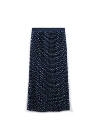 Jupe plissée bleu marine à pois blancs, taille élastique, longueur genou, tissu léger. Texture lisse avec une silhouette fluide.