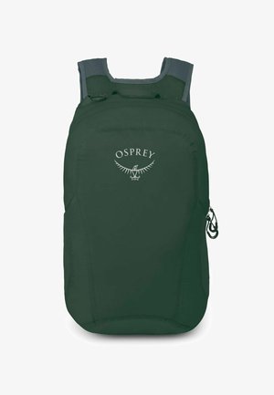 Groene Osprey rugzak van een gladde, duurzame stof. Voorzien van verstelbare, gepadde schouderbanden en een ritsvak aan de zijkant.