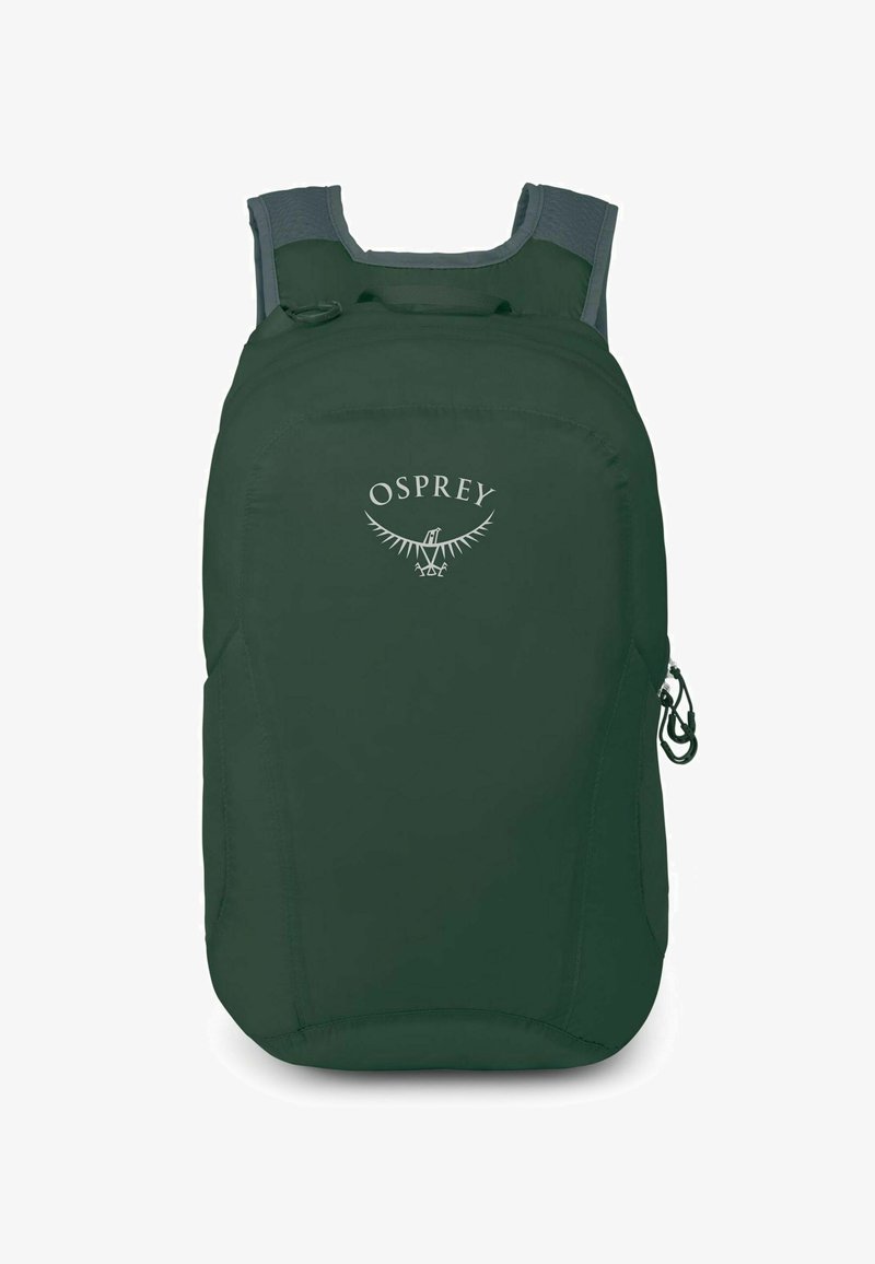 Mochila Osprey verde con una tela suave y duradera. Cuenta con correas de hombro ajustables y acolchadas, y un bolsillo con cremallera en el costado.