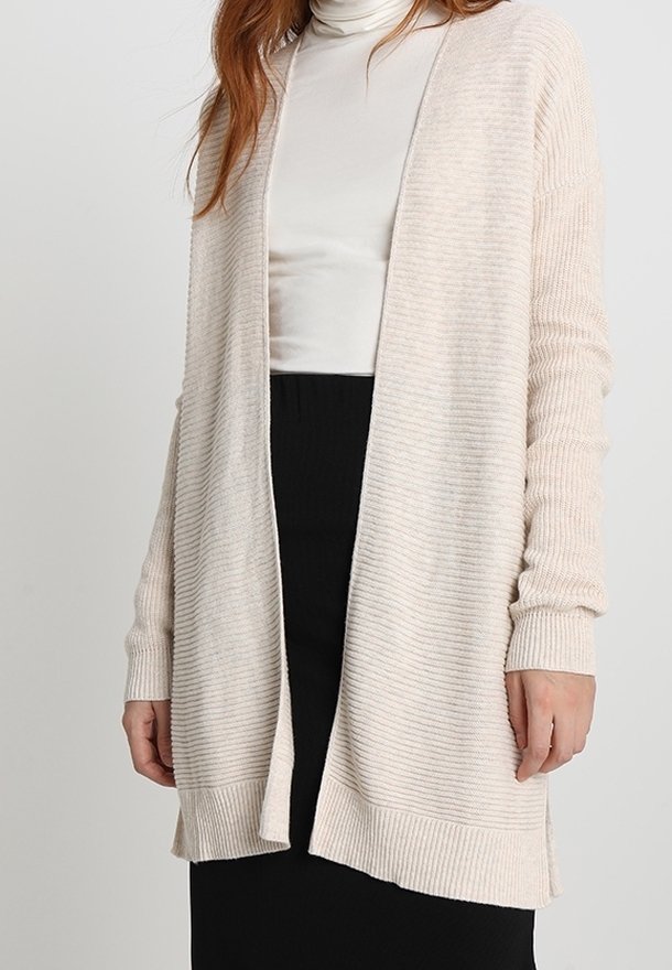 Ljusbeige öppen cardigan tillverkad av texturerat stickat tyg med subtila ränder, långa ärmar och ribbad nederkant samt ärmslut.