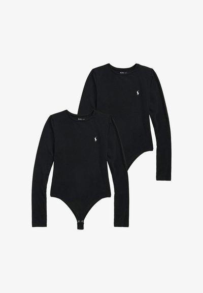 Deux bodies noirs à manches longues avec cols ronds et fermetures pression à l'entrejambe, chacun arborant un petit logo brodé blanc sur la poitrine.