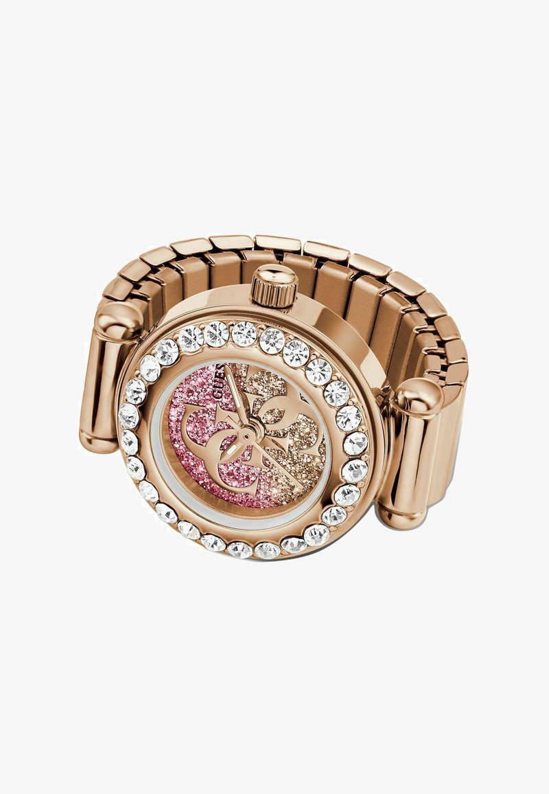 Montre-bracelet en or rose avec bracelet extensible, lunette ornée de cristaux et cadran pailleté bi-ton présentant un logo stylisé et des aiguilles simples.