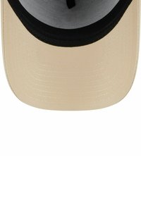 Beige cap with a black visor, featuring a smooth texture. The underside of the visor is gray, with visible stitching along the edges.