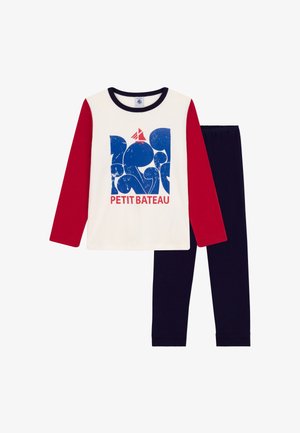Langdurige pyjama set met een crèmekleurig bovenstuk met een blauwe afbeelding en rode mouwen; marineblauwe broek maakt de outfit compleet, gemaakt van zachte stof.