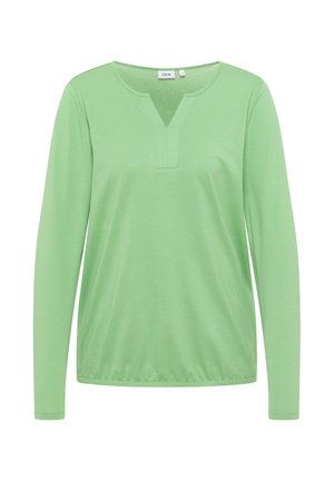 Vaaleanvihreä pitkähihainen naisten paita, jossa on pyöreä kaula-aukko ja etuosassa V-mallinen halkio, joustava helma ja pehmeä puuvillakangas.