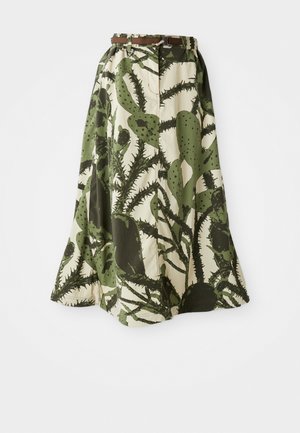 Long skirt featuring a cactus print in shades of green and cream, with a cinched waist and a brown belt for fastening.