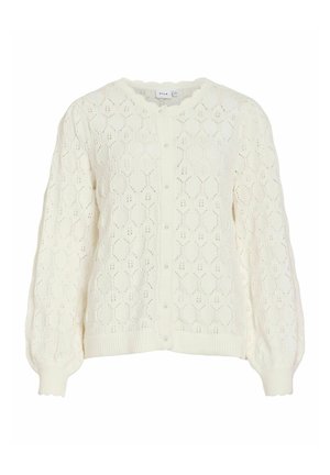 Cardigan en tricot crème avec bords festonnés, boutons nacrés, manches longues bouffantes et un délicat motif ajouré.