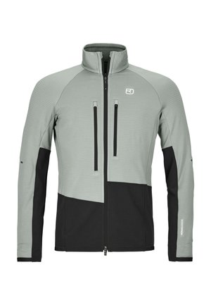 Hellgraue und schwarze Zip-up-Jacke mit hohem Kragen, zwei vertikalen Brusttaschen und einem kleinen Logo auf der linken Brustseite.