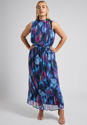Vestido maxi en tejido ligero y transparente con un estampado floral en azul, rosa y púrpura. Cuello alto, cintura fruncida y dobladillo con volantes.