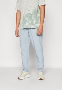 Under Armour UNSTOPPABLE - Pantalon de survêtement - harbor blue/black