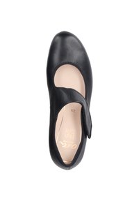 Chaussure en cuir noir avec un bout arrondi, un design découpé et une sangle sur le dessus. L'intérieur présente un doublure beige clair et un logo.