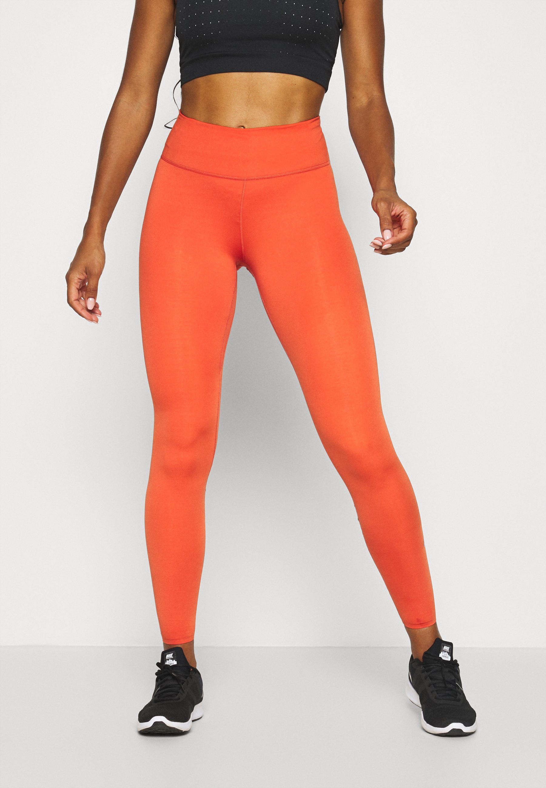 orange leggings nike