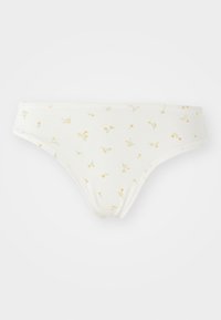 Bijela pamučna bikini donji veš s cvjetnim uzorkom u svijetlozelenoj i žutoj boji. Ima dizajn s niskim strukom i glatku teksturu.