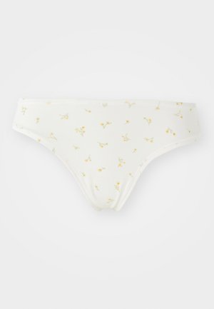 Un sous-vêtement bikini en coton blanc avec un motif floral en vert clair et jaune. Il présente un design taille basse et une texture lisse.